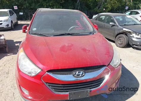 2012 Hyundai Tucson Limited from USA, damaged, VIN KM8JUCAC2CU381152